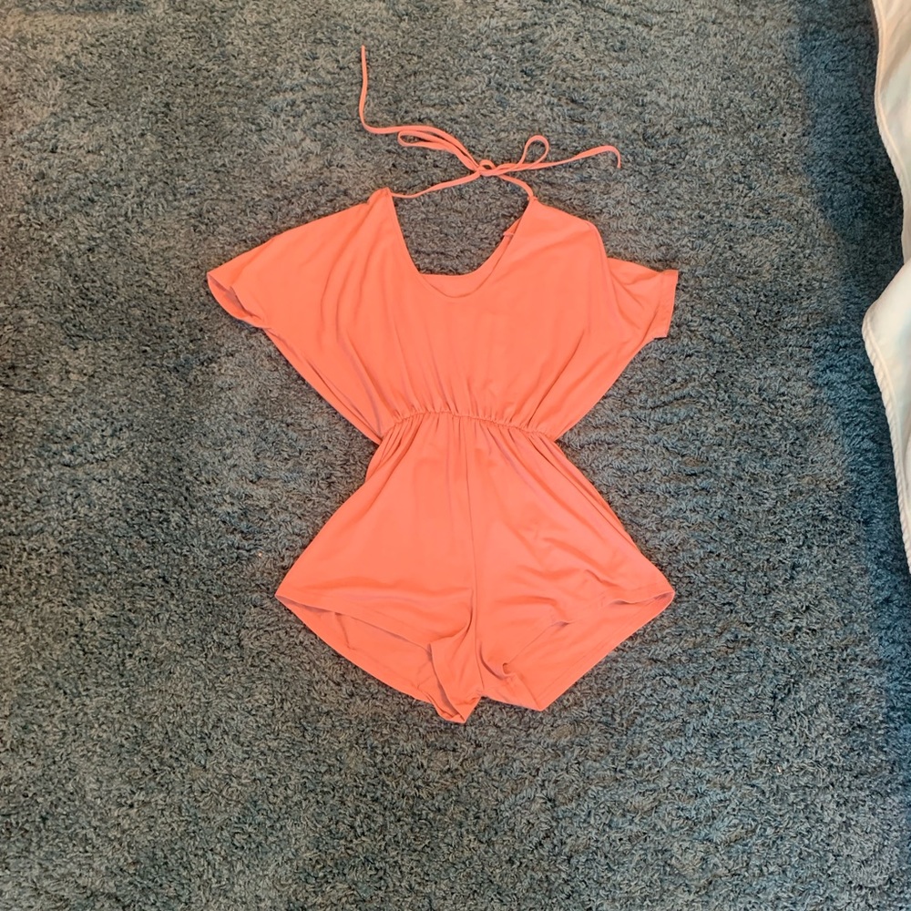 Mauve romper. Small. Ties around neck.